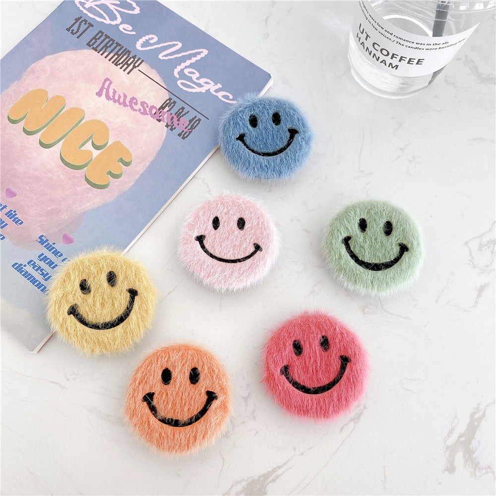 Fluffy Smiley Face Phone Grip